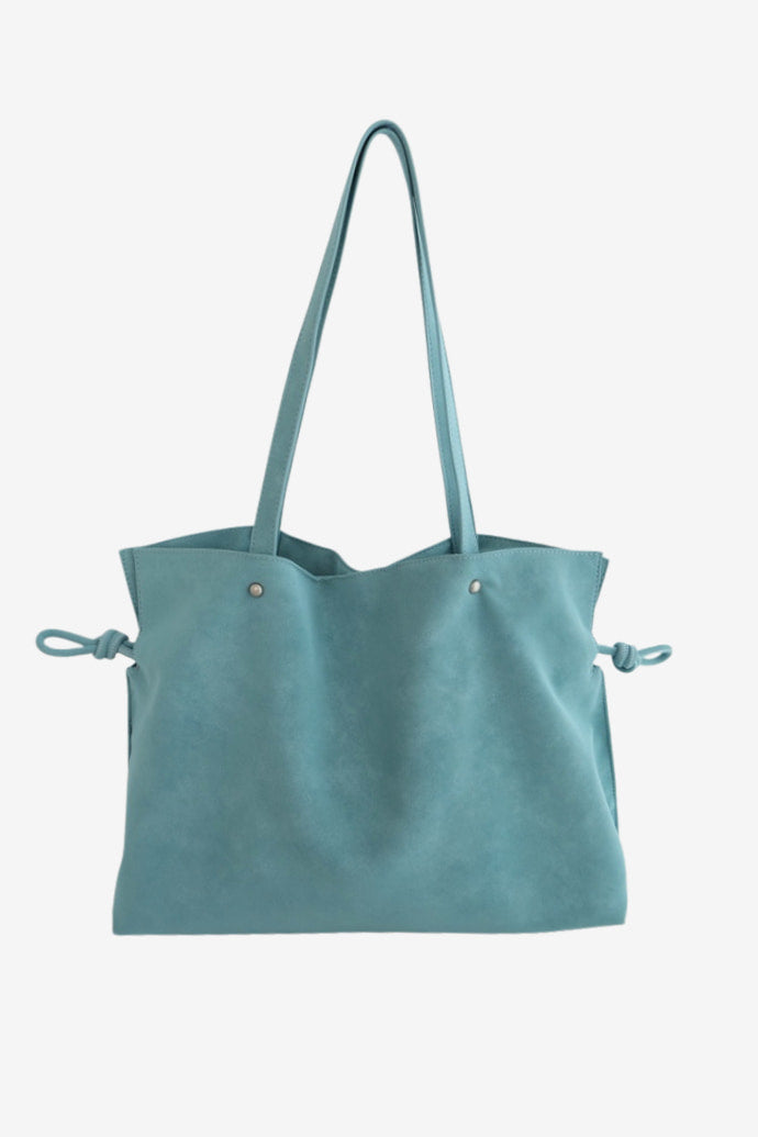 Isabelle Bag in Sky — front view on light grey