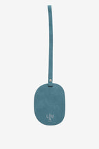 Isabelle Bag in Sky — bag charm, front, on light grey