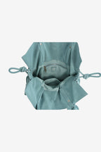 Isabelle Bag in Sky — open, viewed from above, on light grey